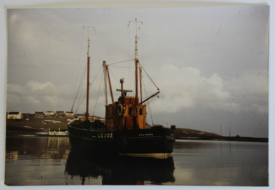 Scallop fishing boat the Ross Don, pictured in peaceful inshore waters c. 1970.