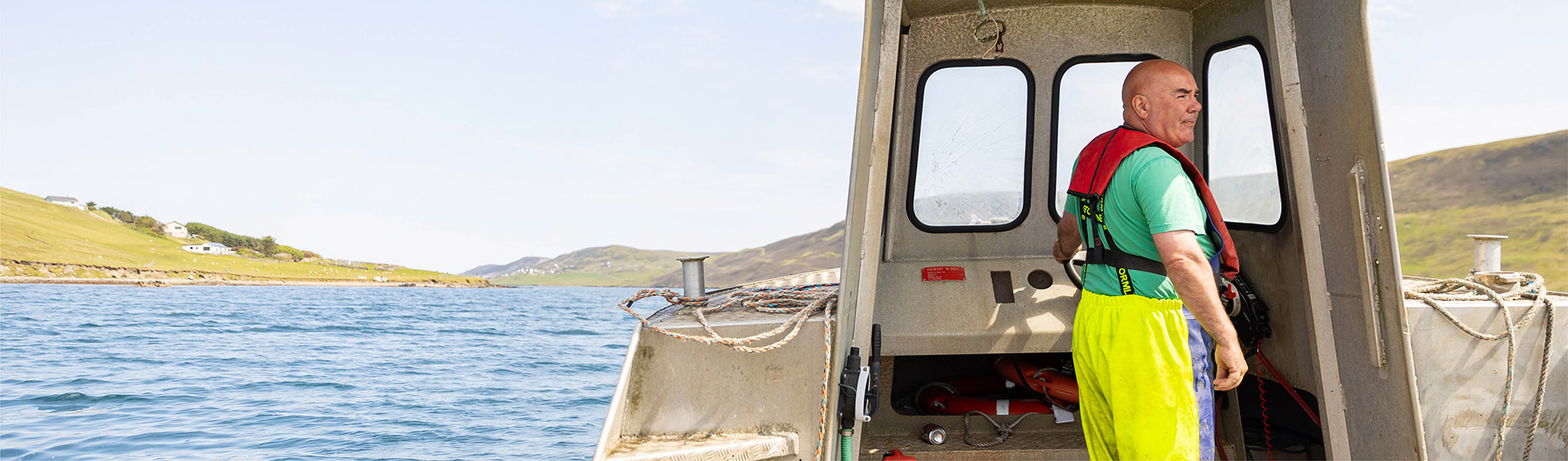 Shetland mussel farmer on boat